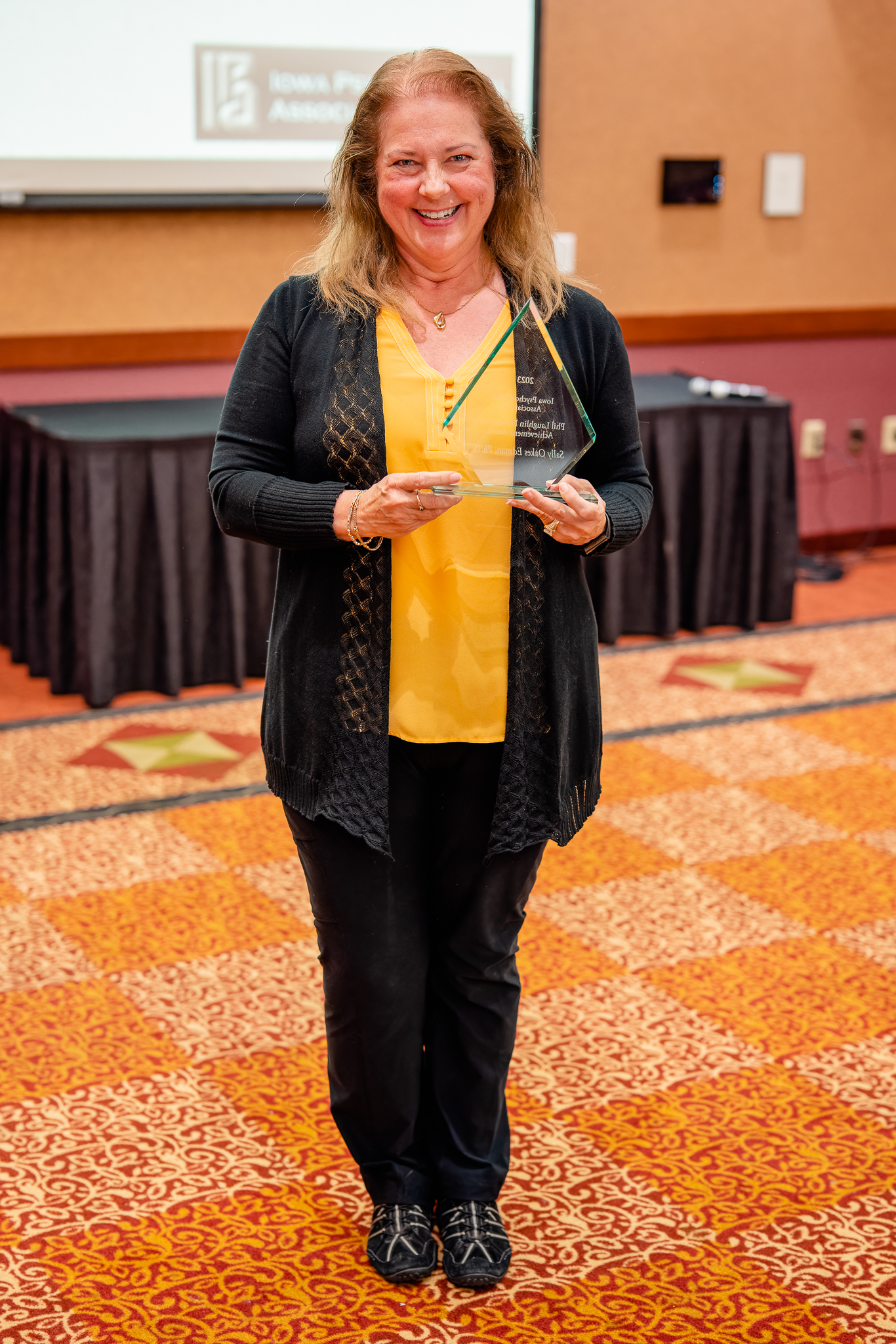 Dr. Oakes Edman with her award